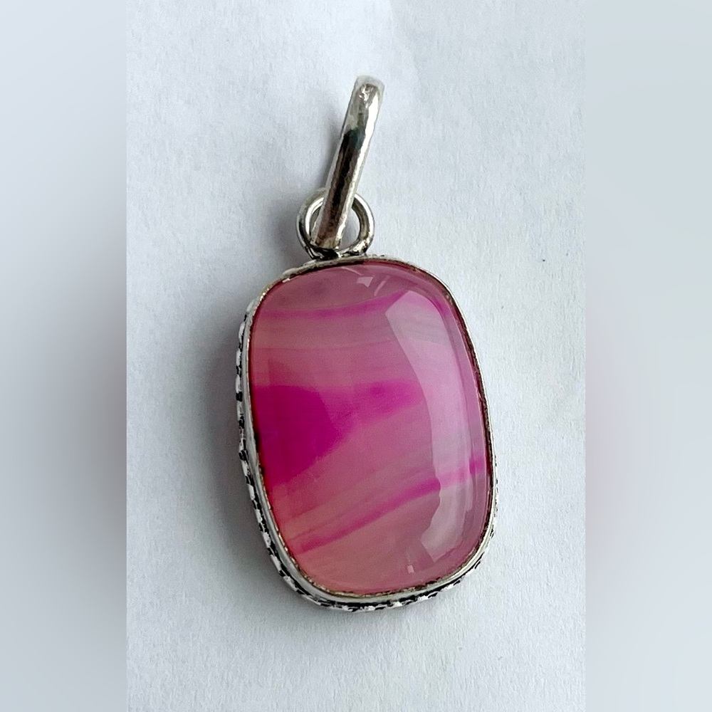 Pink silver tone pendant jewelry